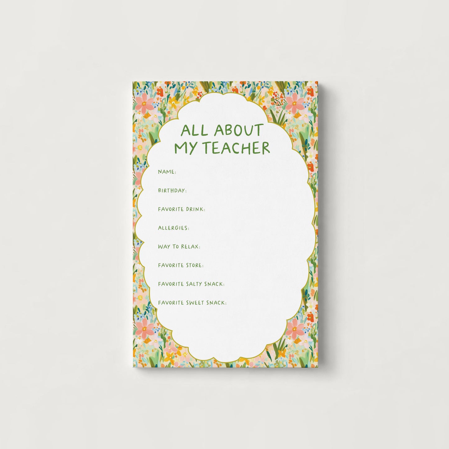 A rectangular printed cardwith a floral border and the title 'ALL ABOUT MY TEACHER' in green text, shown centered on a light gray background.