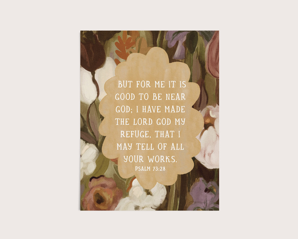 A square art print featuring a floral painting background with a central beige cloud-shaped label containing a Bible verse from Psalm 73:28 in cream text.
